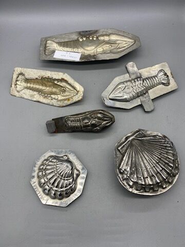 Six tin molds, shell, crayfish, lobster.
20th...