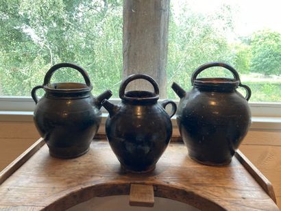 AUVERGNE? Three jugs with handles in black...