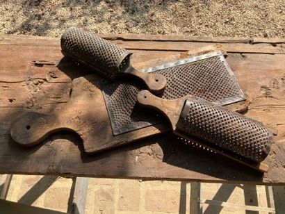 Three wooden and iron potato graters. One...