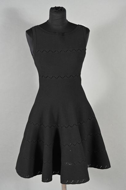 ALAIA. Black jersey openwork skater dress,...