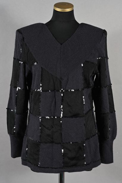 COURREGES. Wool and spun-knit sweater, checkerboard...