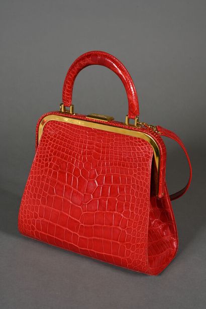 DIOR. Clasp bag in red crocodile-style leather,...