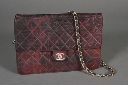 CHANEL Vintage. Clutch bag in quilted burgundy...
