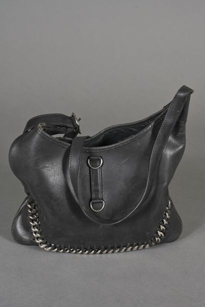 ANONYMOUS. Black leather bag in the spirit...