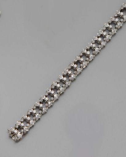 Bracelet en or gris 18K (750/oo) à maillons...
