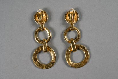 YVES SAINT LAURENT. Pair of gilded metal...