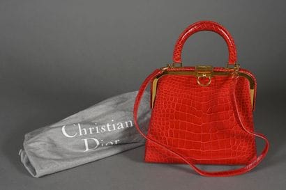 DIOR. Clasp bag in red crocodile-style leather,...