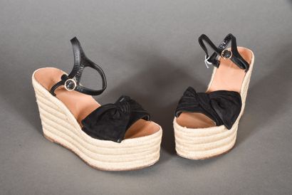 VALENTINO. Pair of nude feet in suede tied...