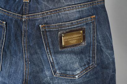 DOLCE & GABBANA. Raw denim denim pants with...