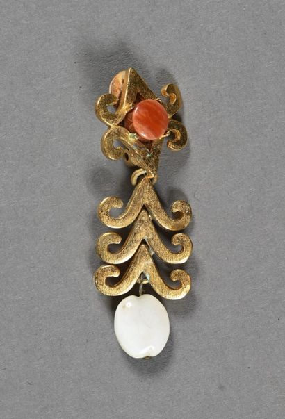 YVES SAINT LAURENT. An earring featuring...