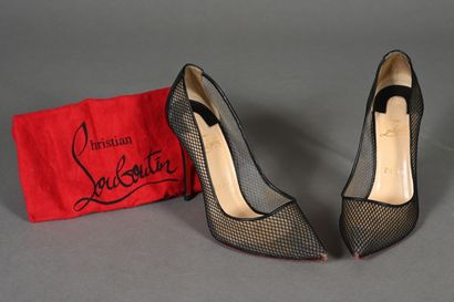 LOUBOUTIN. Pair of black fishnet pumps with...