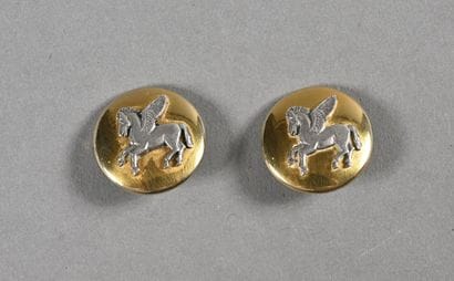 HERMES PARIS. Deux boutons en métal doré...