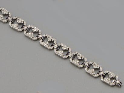 Bracelet en or gris 18K (750/oo) à maillons...