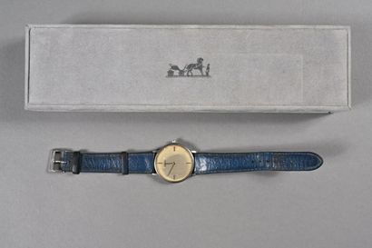 HERMES. Montre à cadran rond en métal argenté,...