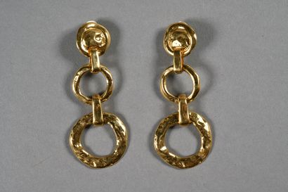YVES SAINT LAURENT. Pair of gilded metal...