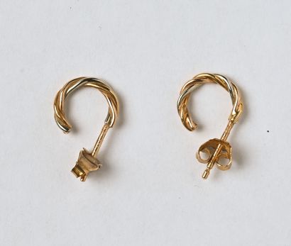 CARTIER : Paire de petites créoles en or...