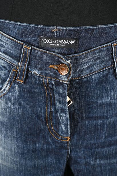 DOLCE & GABBANA. Raw denim denim pants with...