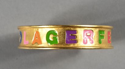 KARL LAGERFELD. Bracelet jonc en métal doré...