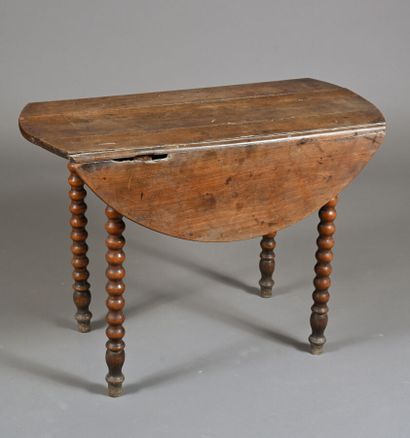 Table en bois mouluré à volets déployant,...