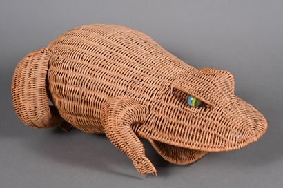 Grenouille en osier tressé, des billes formant...