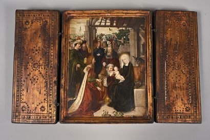 Triptyque en bois mouluré et sculpté figurant...