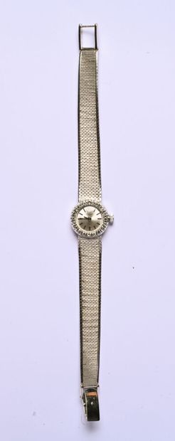 TISSOT : Montre en or gris 18K (750/oo),...