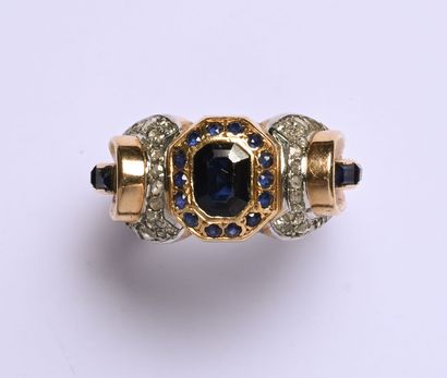 Bague en or jaune 18K (750/oo) et platine...