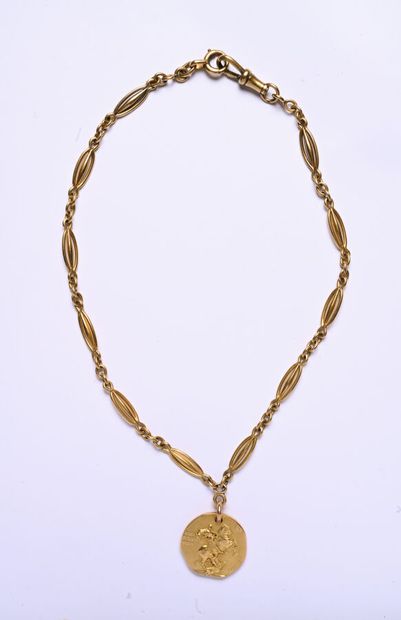 Collier en or jaune 18K (750/oo) composé...