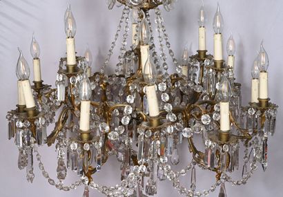 Lustre en bronze doré orné de fleurs et feuillages,...