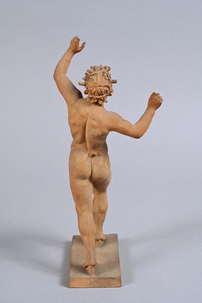 Statue en terre-cuite figurant un faune dansant...