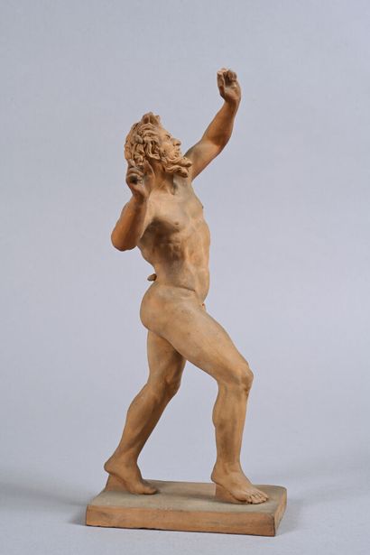 Statue en terre-cuite figurant un faune dansant...