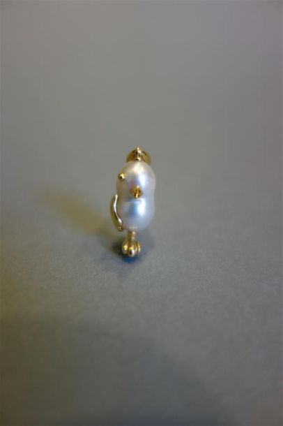 Pendentif en or jaune 18K (750/oo) figurant...
