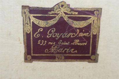 GOYARD.
Valise en toile enduite havane signée...