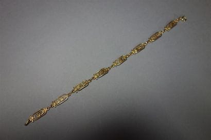 Bracelet en or jaune 18K (750/oo), les maillons...