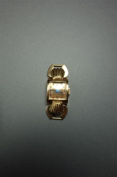 RENA : Montre de dame en or jaune 18K (750/oo),...