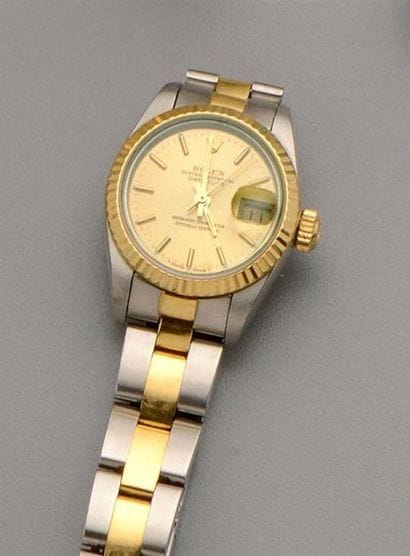 ROLEX : Montre de dame en acier et or jaune...