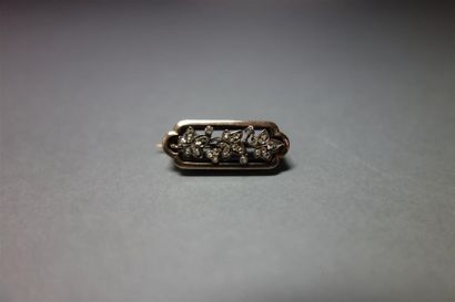 Petite broche barrette en or jaune 18K (750/oo)...