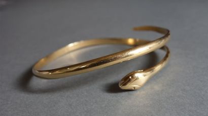 Bracelet jonc ouvert en or jaune 18K (750/oo)...