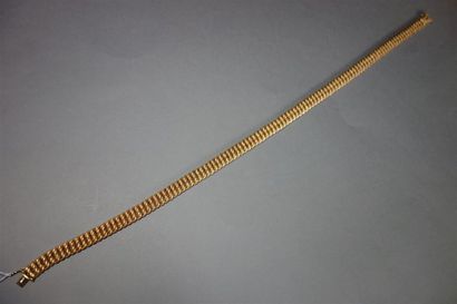 Collier en or jaune 18K (750/oo) maille américaine....