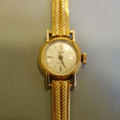 PHILIPPE : Montre de dame en or jaune 18K...
