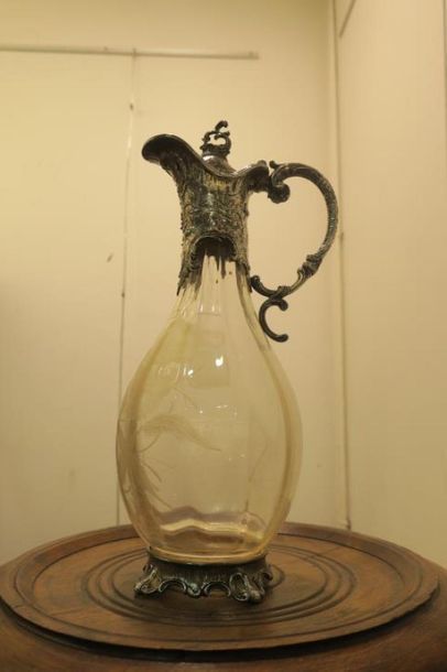 Verseuse en verre et métal argenté. 