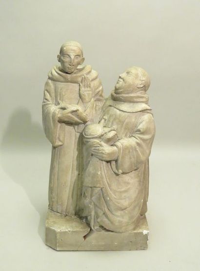 Groupe en plâtre représentant deux moines....