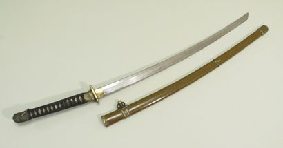 Sabre d’officier japonais Shin Gunto.
Poignée...