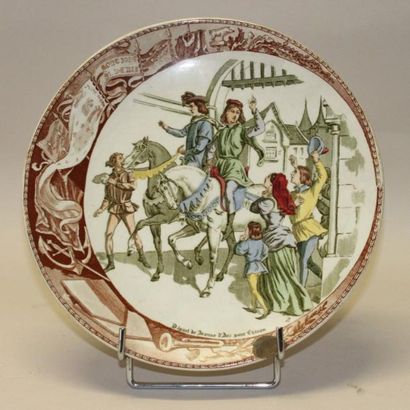 Suite de neuf assiettes en faënce de SARREGUEMINES...