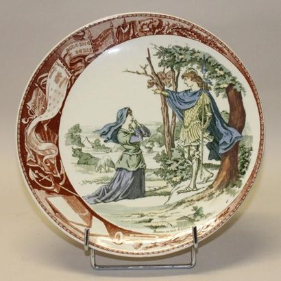 Suite de neuf assiettes en faënce de SARREGUEMINES...