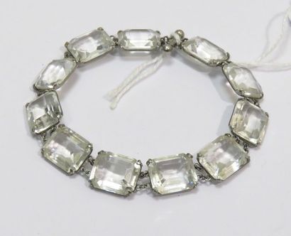 Bracelet articulé en argent, sertie griffes...