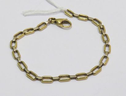 Bracelet en or jaune et blanc à grandes mailles...