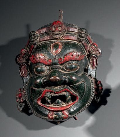MASQUE LAMAÏQUE, NÉPAL
Bois à patine brun...