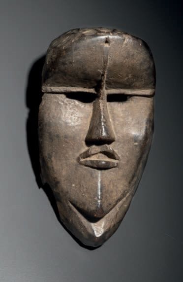 DAN MASK, LIBERIA
Wood with brown patina
H....