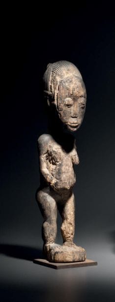 STATUETTE BAOULE, IVORY

COAST Wood with...